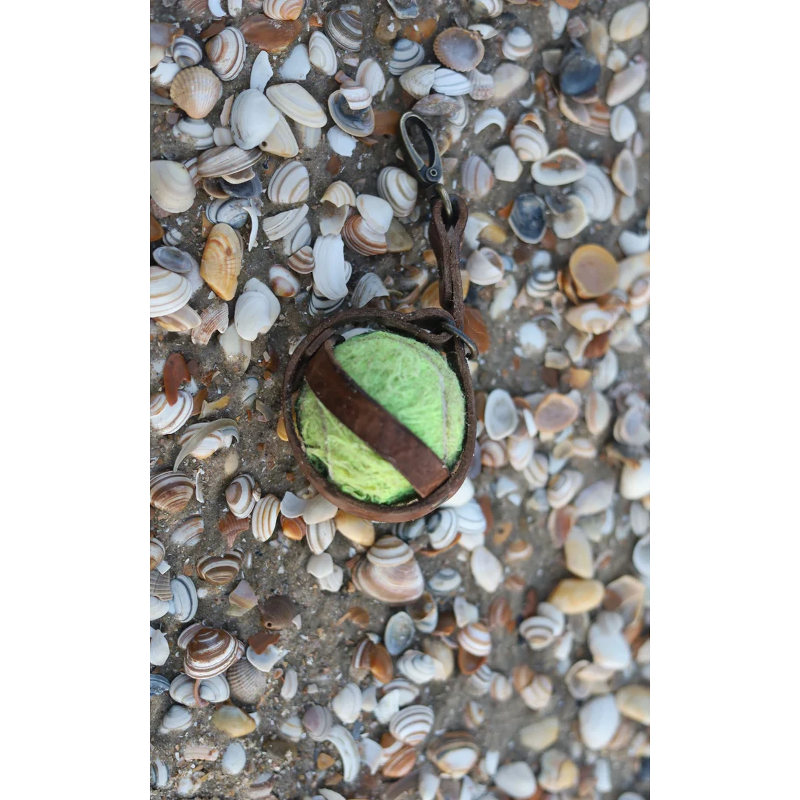 Cooper & Quint brown leather tennis ball holder